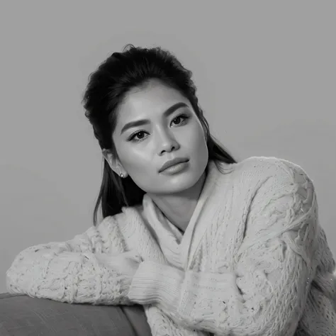 A close-up of a woman sitting on a sofa with a sweater on., Retrato de la Darna moderna, b&w photo, Cindy Avelino, Foto oficial, imagen vertical, editorial photograph, Gemma Chen, Retrato en blanco y negro, promo image, " , por Shen Che-Tsai, Foto promocio...