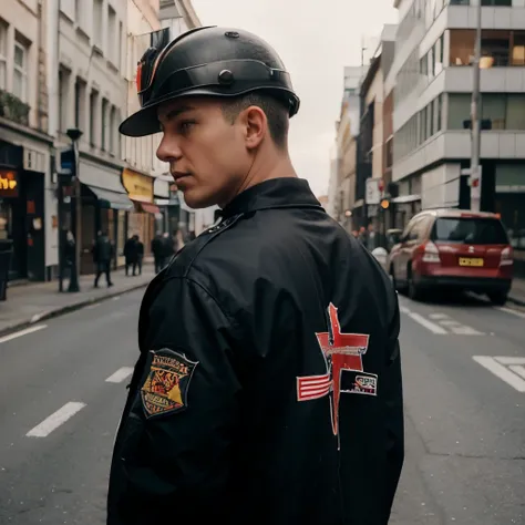 1boy Facing back and Is showing off his patch at the back of his jacket and it logo feature at the back, is British bulldog wearing a german helmet 