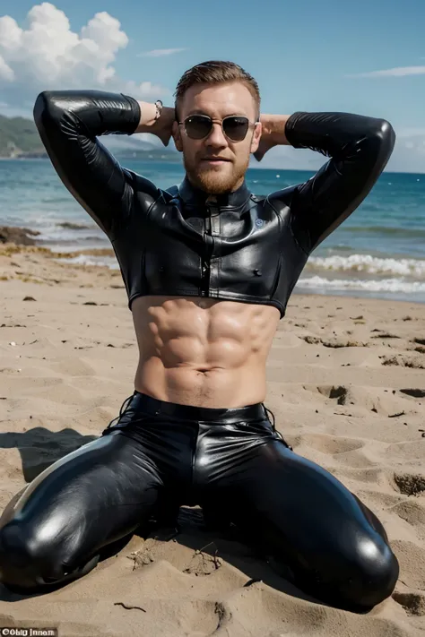 conor mcgregor smiling in shades, in tight shiny black leather pants, manspread on the beach. arms over head.