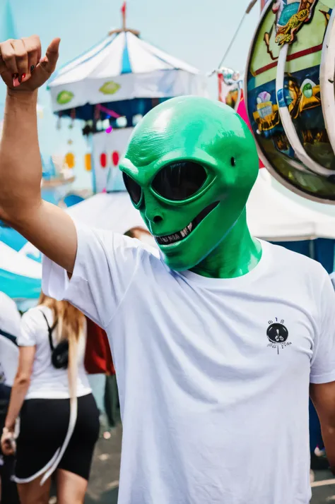 A person dressed as an alien in a carnival scene and wearing a white T-shirt. Hyperrealistic image.