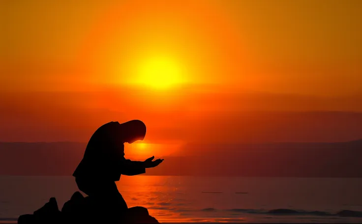 silhouette of a person standing on a rock with a cell phone, kneeling in prayer, rezando ao sol, ajoelhado, praying, doing a pra...