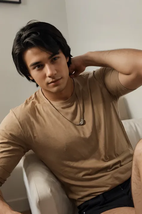 Handsome young man with black hair posing for a professional photograph for a cv