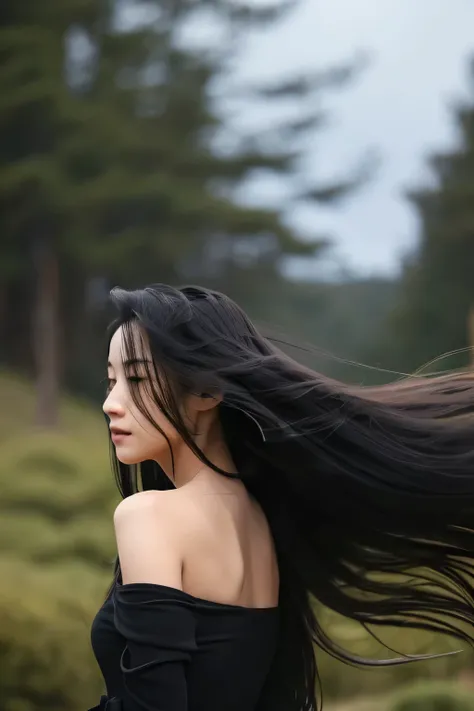 long black haired woman looking back　A strong wind blows through my hair, and blow to the left. can&#39;you can&#39;t see my face at all.