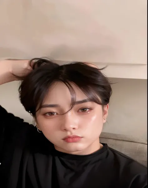 There is a man sitting on a couch with his hair in a bun., jungkook, kim doyoung, foto de perfil en la cabeza, cai xukun, hyung tae, jinyoung shin, 22 years, 27 years old, pale korean adorable face, kim taejin, 23 years, taken in the early 2020s, 28 years ...