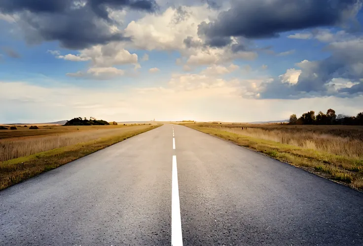 a close up of a road with a sky background and clouds, empty road in the middle, open road, empty road, long road, the road, wide roads, paved roads, on a road, road, accurate roads, wide landscape, highway, country road, plain stretching into distance, lo...