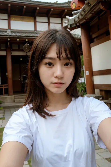 17 year old Japanese girl takes selfies at a temple