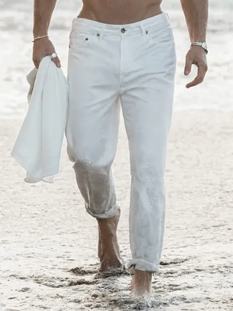 Tired man walking on beach with towel and towel, white pants, minor wear, well worn, wearing White clothes, wearing white clothes, White clothes, Clear details, White clothes, Wear only pants, clean details, Detailed white, full white, with white, white sh...