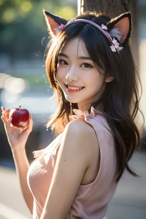 Hand holding a red apple，blue top
