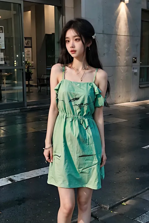 A 16-year-old girl on the side of the street, facing us, wearing a knee-length dress, shoulder-length hair in a dark green dress.