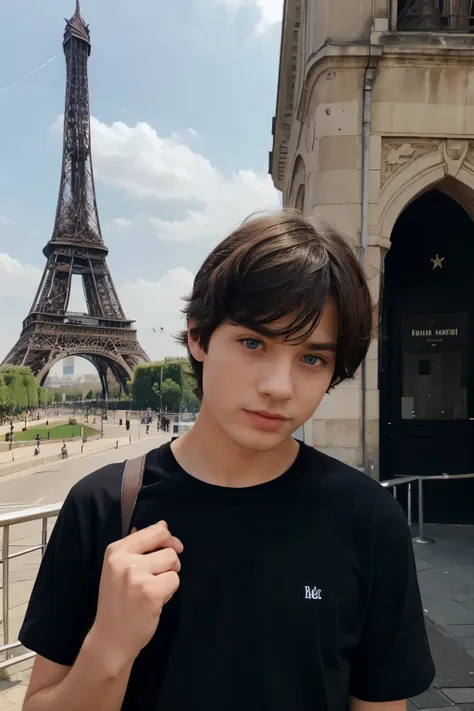 A blue-eyed boy in a black shirt with cream hair stands in front of the Eiffel Tower