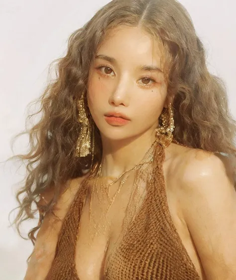 a close-up of a woman with long hair wearing a brown bikini, zoë kravitz, retrato de sophie mudd, taken at the beginning of 2020...