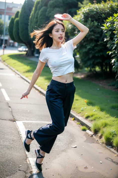 woman，catch frisbee，overhead shot，jump，whole body，trousers