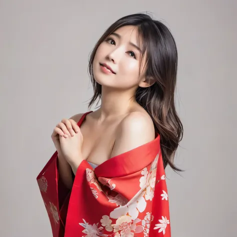 Cute Japanese woman with her red kimono off to her shoulders, shyly covering her breasts with her hands.