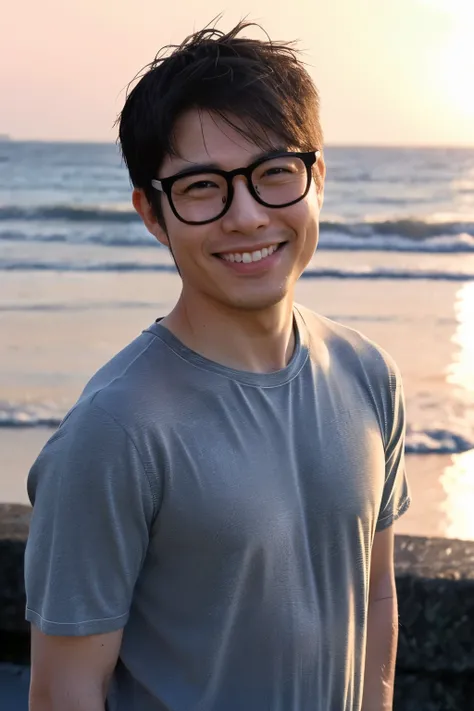 A 35-year-old Japanese man wearing glasses. The background is the sea. His smile resembles Tom Cruise.