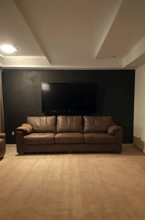 Luxurious basement, black, l shape sofa, 50" TV, carpet floor, 1 texture accent wall, recessed LED lighting, warm amber lighting tones