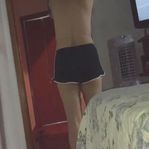 there is a woman in a black underwear taking a selfie, back - view, back - shot, backview, exposed thighs!!!, seen from the back, photo taken from behind, picture from behind, back shot, rear-shot, seen from behind, shot from the back, back view!!, backsho...