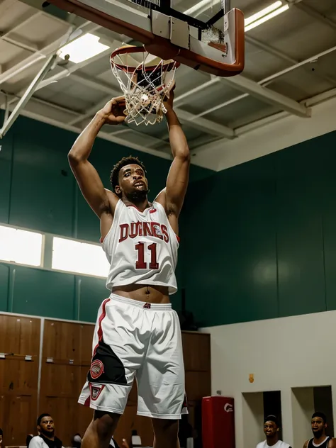 Jogador de basquete fazendo uma dunker