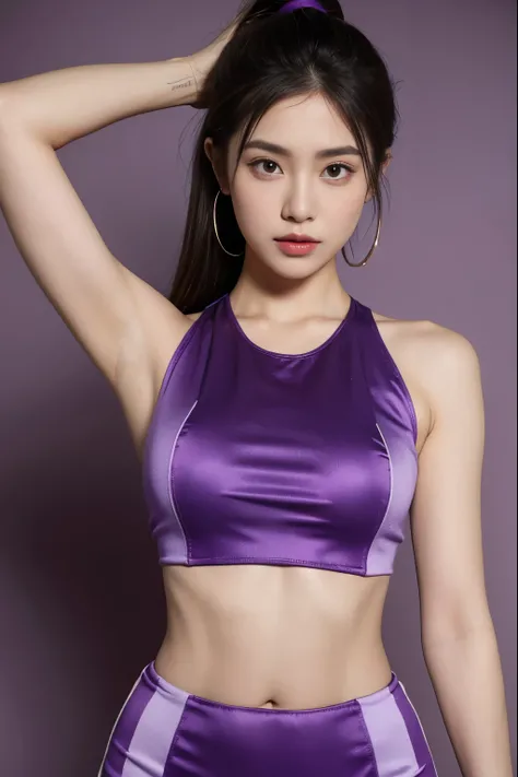 a woman wearing a purple crop top