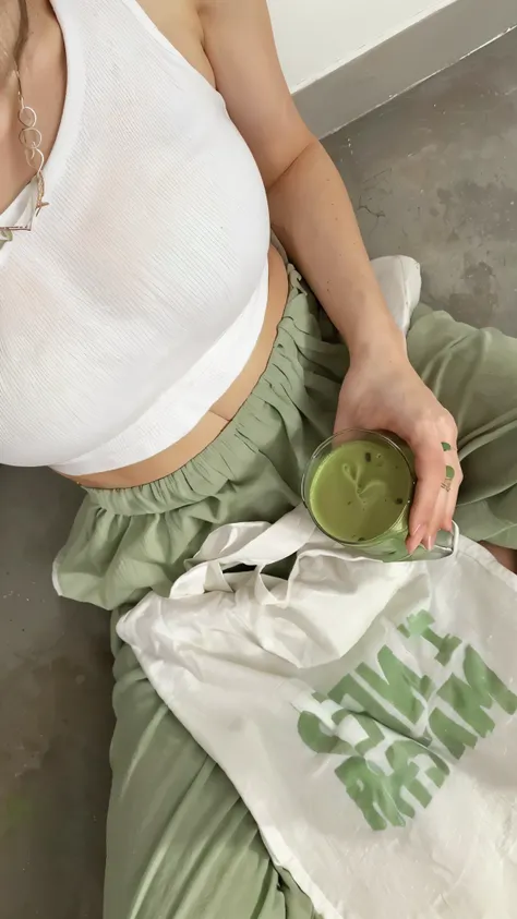 There is a woman sitting on the floor holding a cup of green liquid, 😭 🤮 💕 🎀, 🤬 🤮 💕 🎀, ropa verde, 🍸🍋, loputyn y matcha, ropa verde, dirty ropa verde, verde apagado, esteestilo, 🎀 🧟 🍓 🧚, by Emma Andijewska, Clean aesthetics