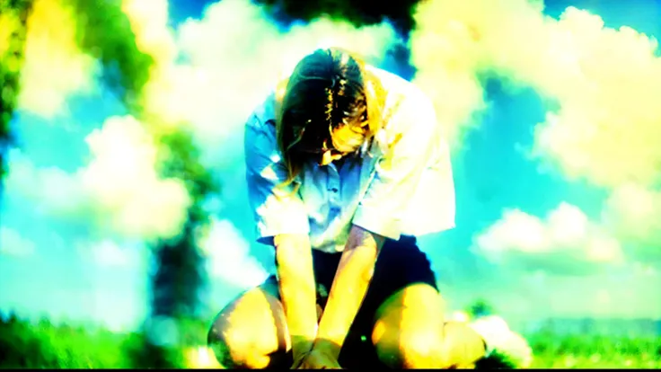 a 25-year-old girl praying on his knees and holding hands in prayer, slightly blurred cloud background, close-up of a man wearing a white shirt, eyes closed, blond hair, detailed face, natural lighting, realistic, cinematic, --ar 16:9