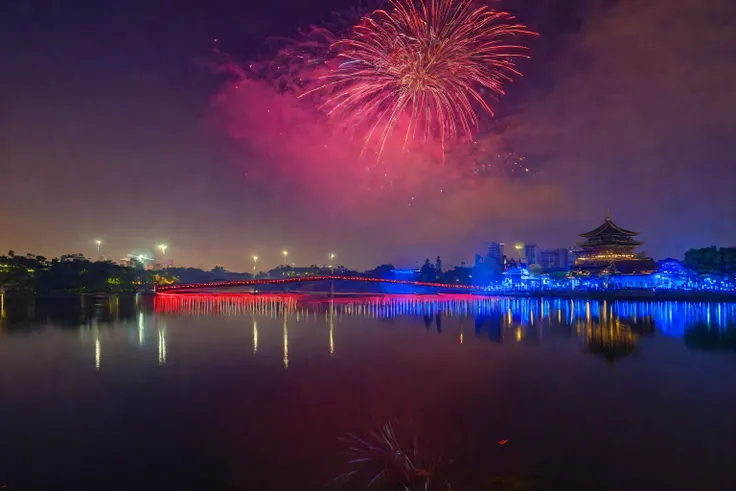 Alafed Red Bridge on the Lake，The background is a building, Photography taken at the blue hour with red and blue reflections, Night scenery, long exposure photos, Long exposure photography,Fireworks at night, Fireworks, [ Fireworkss in the sky ]!!, firewor...