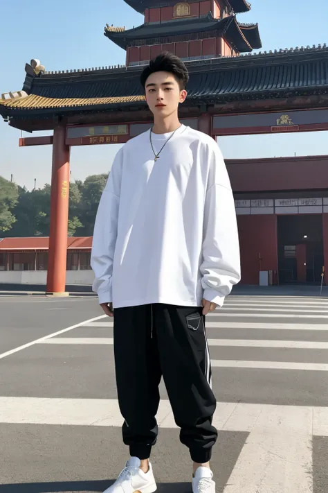 a beijing young man in a white oversize t shirt long sleeve and black jogger trousers stands against a station center background...