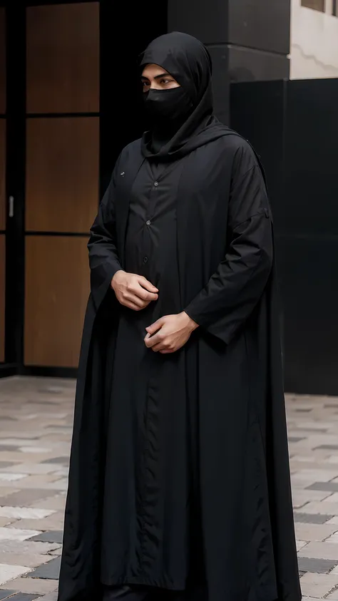  A masked man wearing an abaya that does not show his face