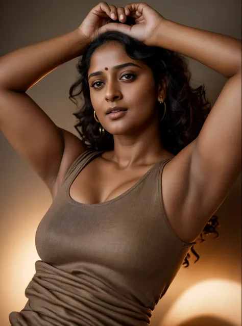 Looks like Anushka Shetty, a photo portrait of a beautiful girl 40 years old, with curls, styled black hair, (face portrait:1.5), dramatic light, Rembrandt lighting scheme, bust shot, linen tank top , top quality editorial photograph, skin texture, skin po...