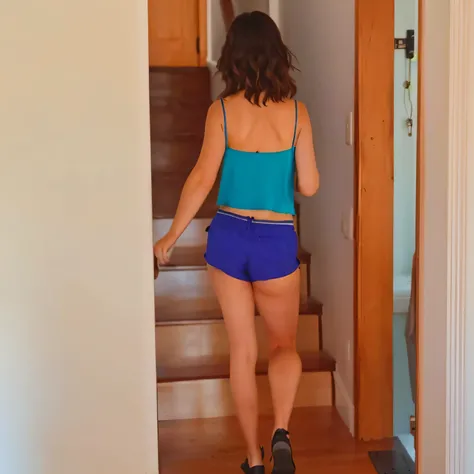 there is a woman walking up the stairs in a blue top, coming down the stairs, side view of her taking steps, in shorts, uhd candid photo of dirty, walking away from the camera, walking away from camera, booty shorts, gif, exposed thighs!!!, wearing a camis...