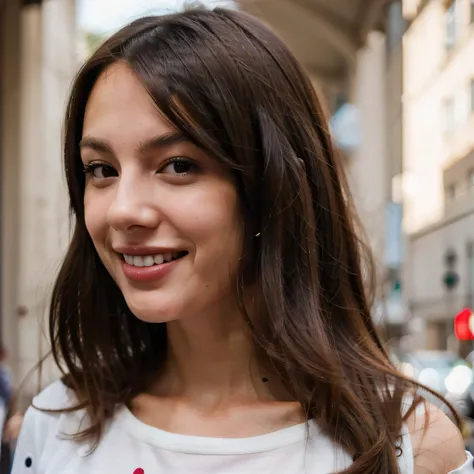 Profile picture of a brunette with pefect long haor, beautiful smile and perfect shoulders, wearing a polka dots tshirt