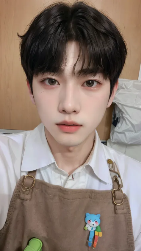 there is a young man with a brown apron and a green toy, Kim Doyoung, male ulzzang, Jinyoung Shin, jung jaehyun, cai xukun, adorable and pale korean face, Tae June Kim, profile picture with headshot, Sakimichan, hyung tae, Jungkook, ulzzang, inspired by Ku...