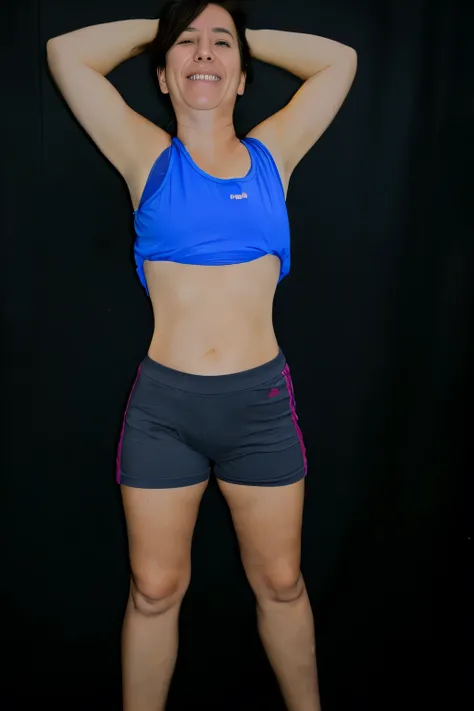 arafed woman in a blue sports top and black shorts posing for a picture, fit pic, half body cropping, sport bra and dark blue shorts, half body photo, middle body shot, sport bra and shorts, [ adamantly defined abs ]!!, physical : tinyest midriff ever, sta...