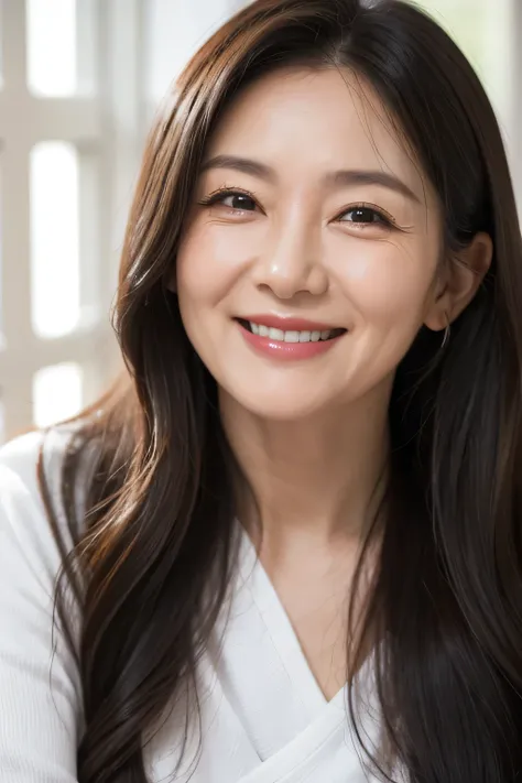 Close-up of middle-aged woman with long hair smiling with wrinkles and nasolabial folds on face