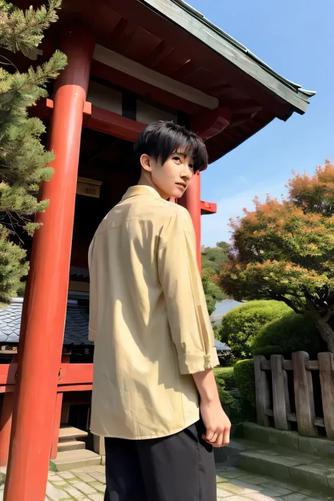 A handsome man is standing and behind the view of Takasume Shrine Japan