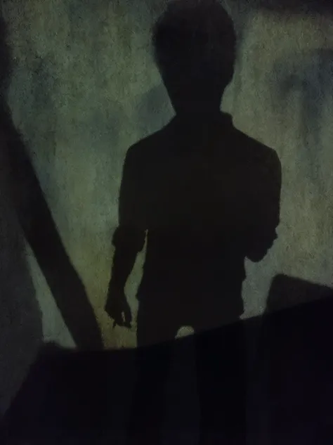 shadows of a person holding a knife and a knife in a dark room, eerie person silhouette, scary shadow people, scary shadows, shadowy and eerie character, he is traversing a shadowy city, standing in a dimly lit room, eerie self - portrait, scary photo, cre...