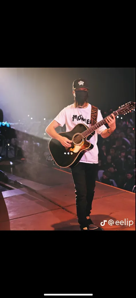 I want him to be sitting like a king with his guitar aside him