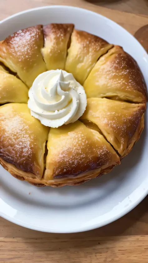 On the table, a sweet pastry in a dish.