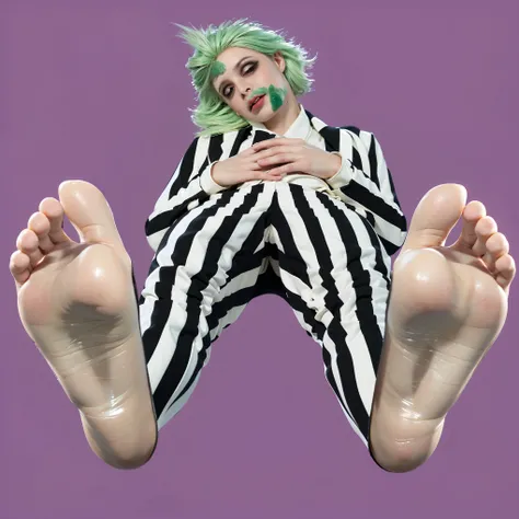 "A person with pale makeup, green messy hair, and dark circles around their eyes, wearing a black and white striped suit. They are slouched back with hands folded over their chest, but their large bare feet are exaggerated in the foreground of the image, c...