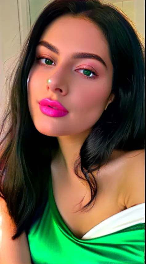 Amazing portrait of a sexy woman with a beautiful face with lustful eyes gazing seductively and parted pink lips smiling as she blushed deeply with her black hair in a bun wearing a green satin shirt that is partially unbuttoned and falling off her shoulde...