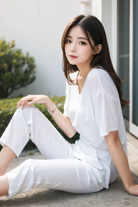 Woman looking sideways　White clothes　Sitting