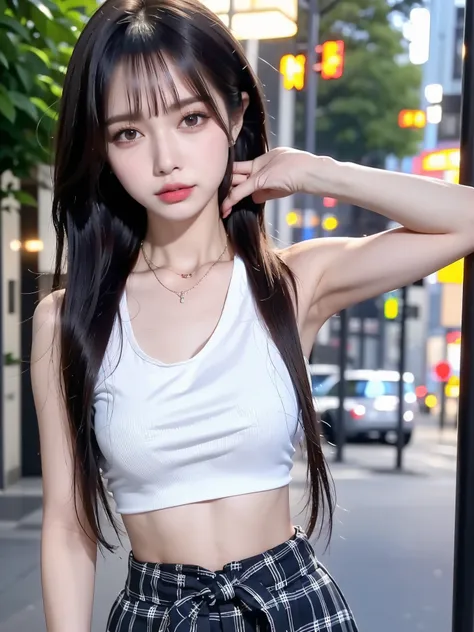 a young woman standing in an outdoor nighttime setting on a quiet street. she is wearing a sleeveless white crop top that shows ...