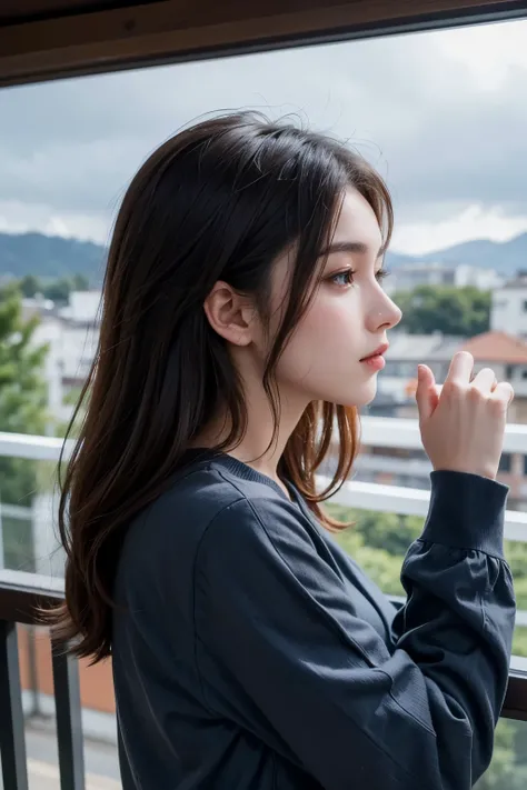 An image of a beautiful woman from the side. profile. Dark brown hair. Twenty-three years old. She is wearing a long-sleeved shirt and looking out at the scenery from the balcony where she lives alone. The weather is cloudy, with a cold blue-gray color.