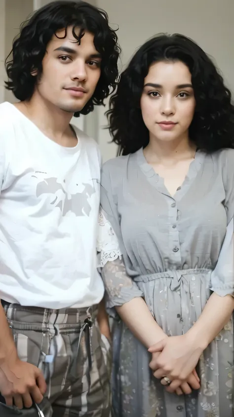 a couple with curly black hair