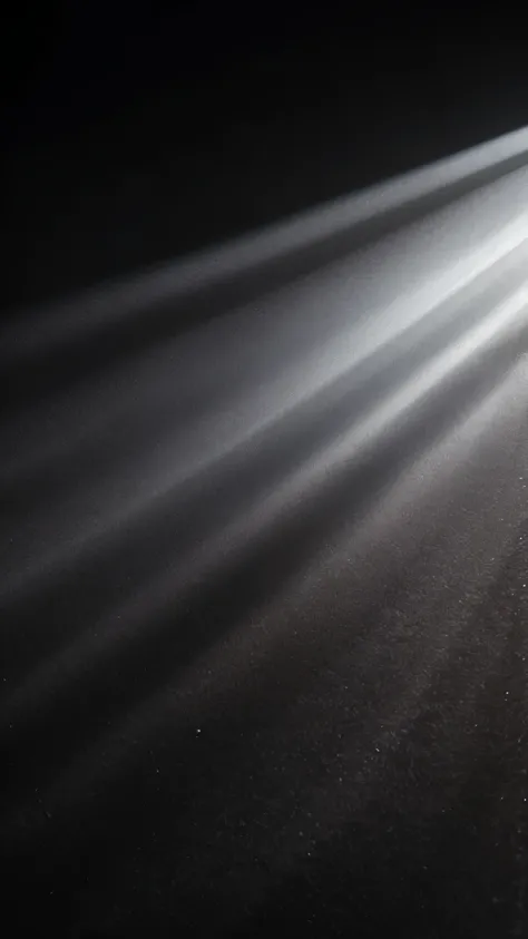 Black velvet fabric.
Only a ray of white light shines through, and the rest of the room is dark.