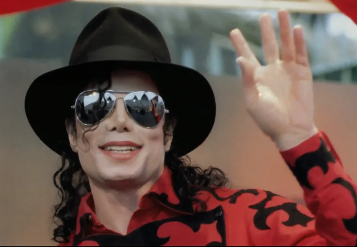 araffe Michael Jackson  waves to the crowd while wearing a hat and sunglasses, Michael_Jackson , Michael Jackson , portrait of Michael Jackson , Michael Jackson  portrait,  he wears a red tie , In a black and red suit, photogrUph credit: Up,  mischievous l...