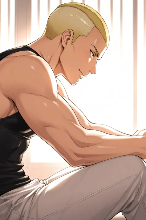 Man with blonde buzzcut, sitting casually, side profile.