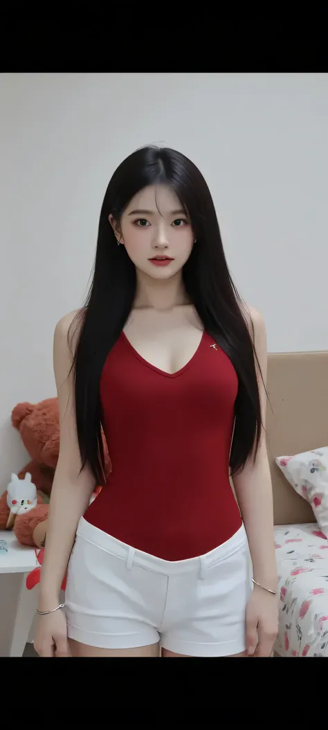 A beautiful young woman with long, straight black hair worn down. She is wearing a tight red V-neck t-shirt and short white shorts. She is standing in a modern bedroom with a soft floral-patterned bed, and a large red polka-dot teddy bear on it. To the lef...