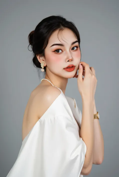 The Thai Asian girl is beautiful, elegant, white, delicate and sharp. She is beautifully made up with soft coral lipstick. Her eyebrows are natural. She wears a white dress with an open shoulder, satin fabric. She looks structured, her hair is neatly arran...