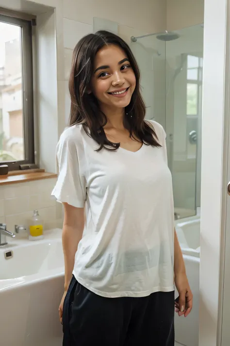   home in bathroom smiling to camera she has a  clean face and black hair latina innocent looking like she just woke up wearing big white shirt and pijama black pants 