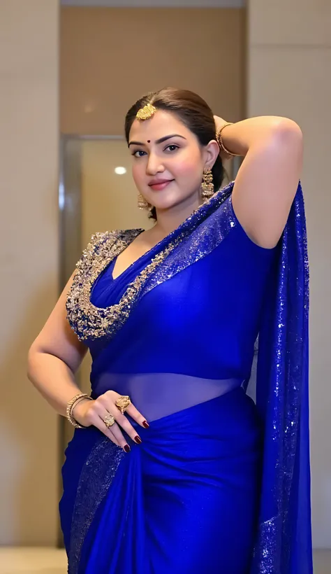 a woman in a blue sari posing for a picture, draped in shiny gold and silver, alluring plus sized model, stunning elegant pose, dressed in a sari, indian super model, blue colored traditional wear, fully covered in drapes, solo photoshoot, doing an elegant...
